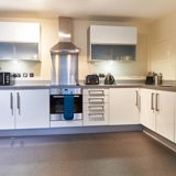 White kitchen in serviced apartment MK9